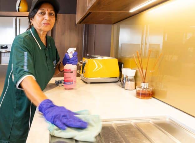 Best cleaners in Auckland CBD mopping apartment floor